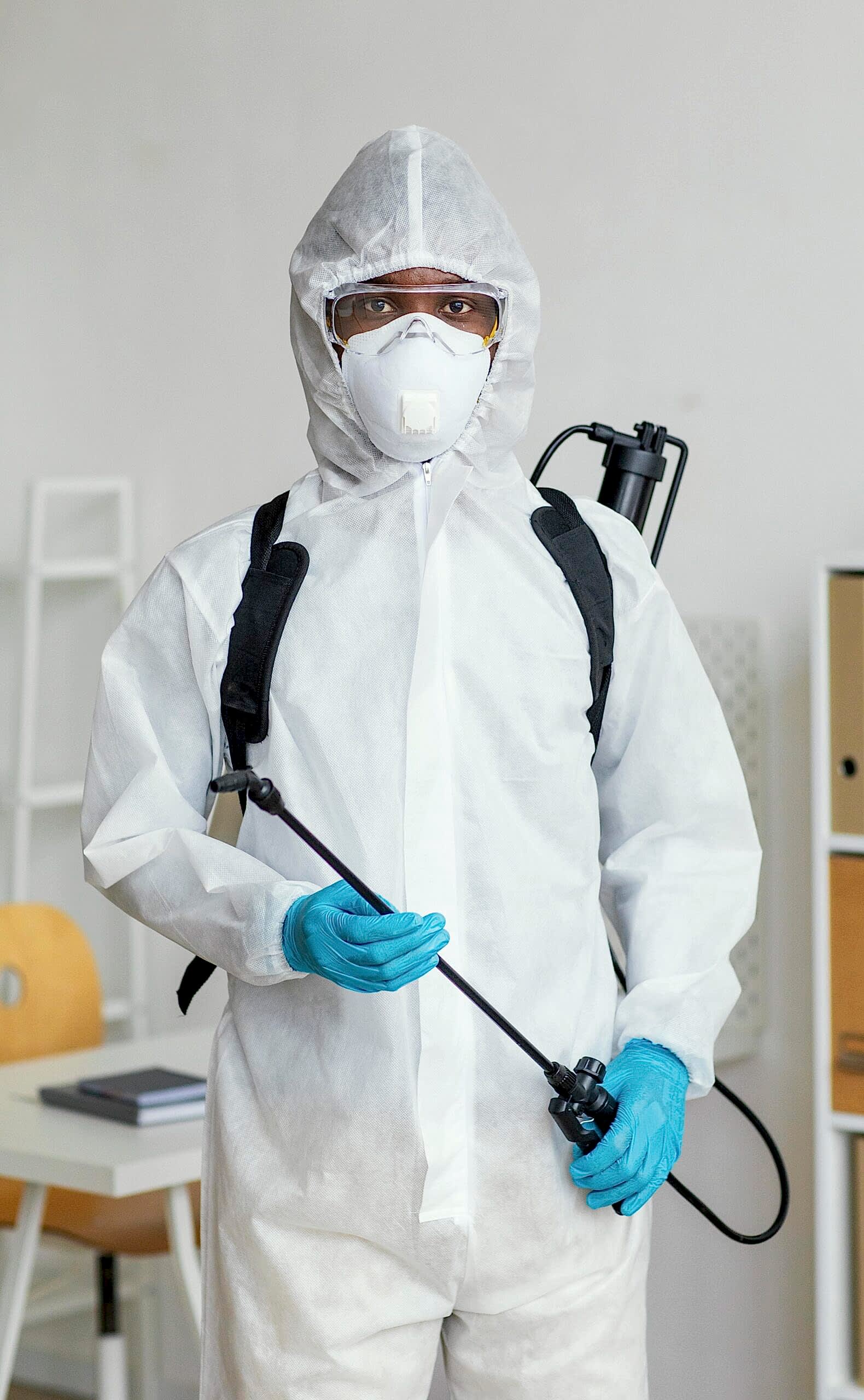 person-protective-suit-getting-ready-disinfect-room